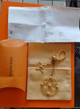 Charme Louis Vuitton dorato